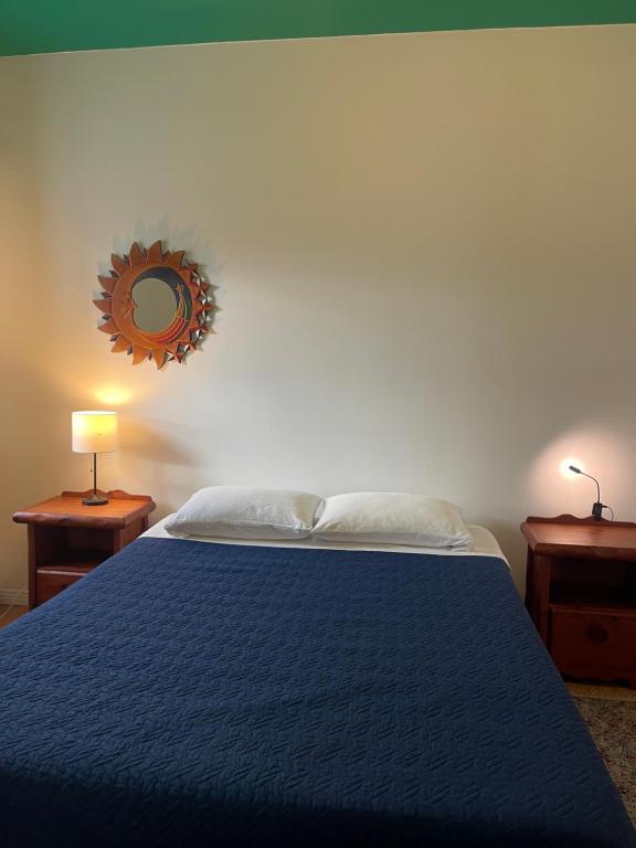 Postel nebo postele na pokoji v ubytování Auberge du Wagon