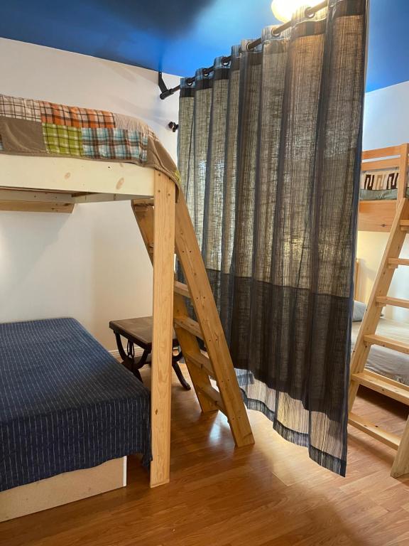 Postel nebo postele na pokoji v ubytování Auberge du Wagon