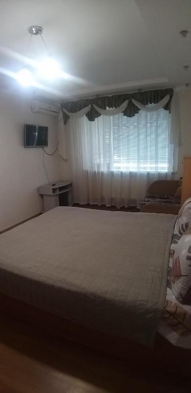 Postel nebo postele na pokoji v ubytování Apartments for rent