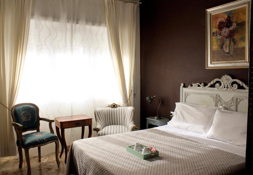 Postel nebo postele na pokoji v ubytování Gregory Place