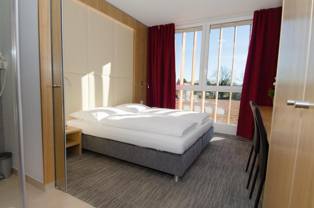 Posteľ alebo postele v izbe v ubytovaní Hubertushof Fromwald Hotel und Gasthof
