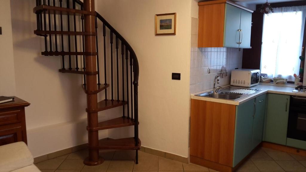 Kuchyň nebo kuchyňský kout v ubytování B&B Chanoux
