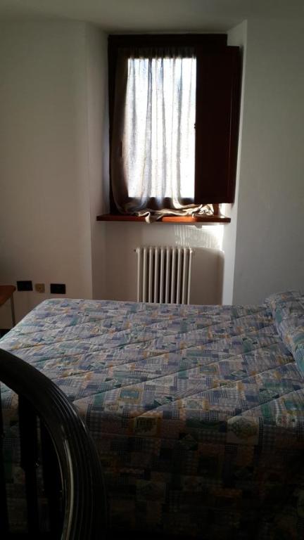 Postel nebo postele na pokoji v ubytování B&B Chanoux