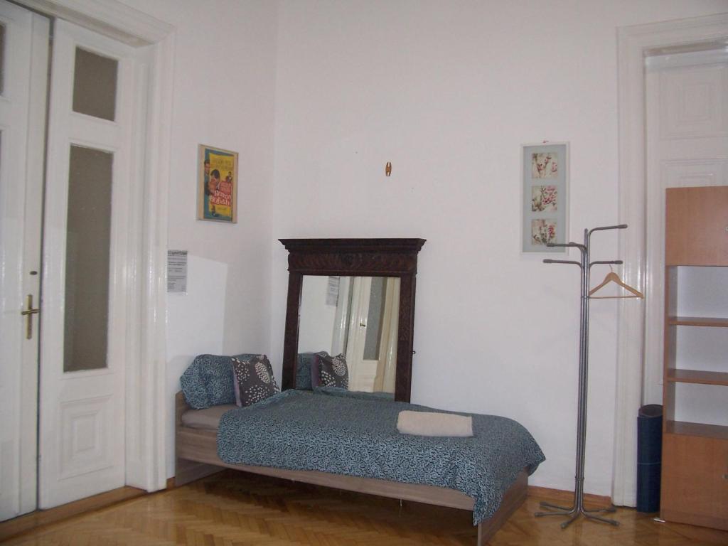 Postel nebo postele na pokoji v ubytování Universal Apartment Budapest
