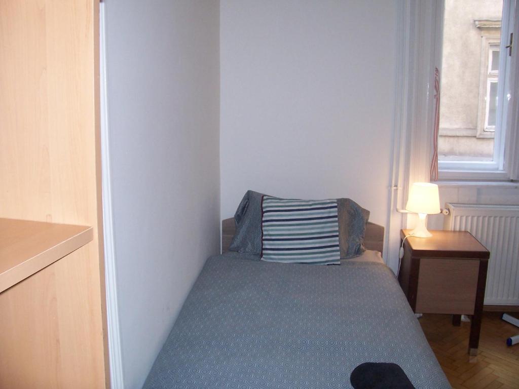 Postel nebo postele na pokoji v ubytování Universal Apartment Budapest