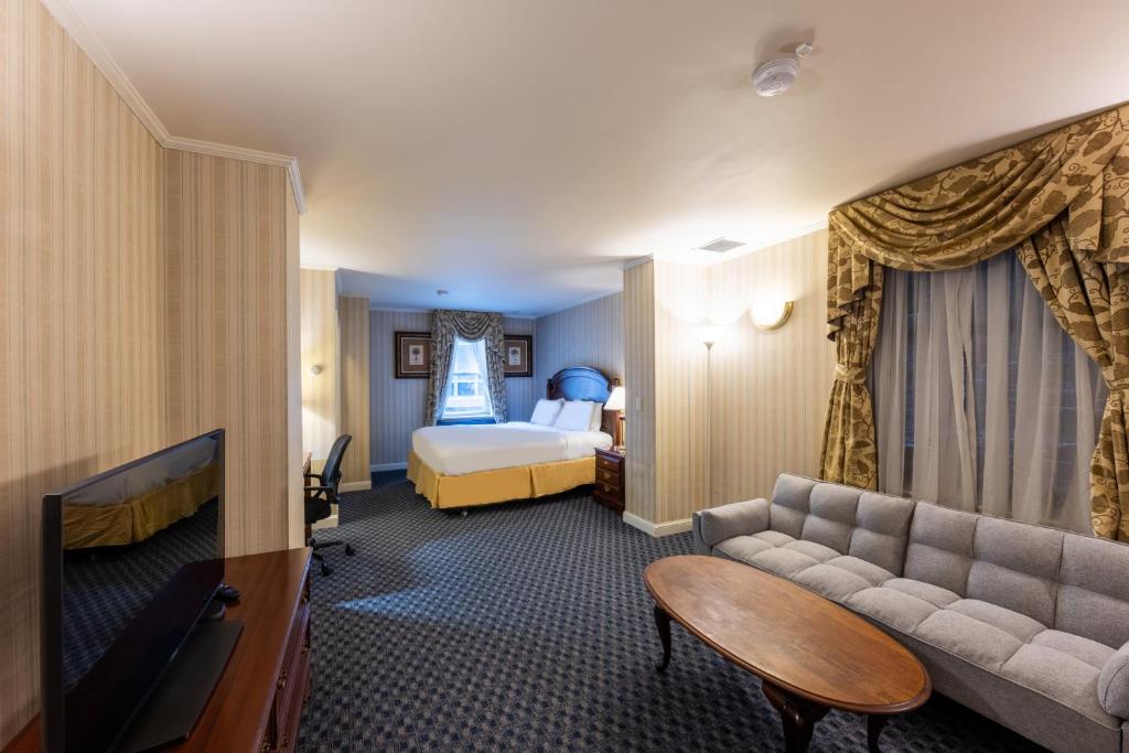 Postel nebo postele na pokoji v ubytování Hotel Stanford