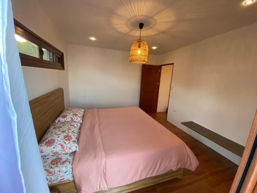 Postel nebo postele na pokoji v ubytování Mard Beach Residence Siquijor