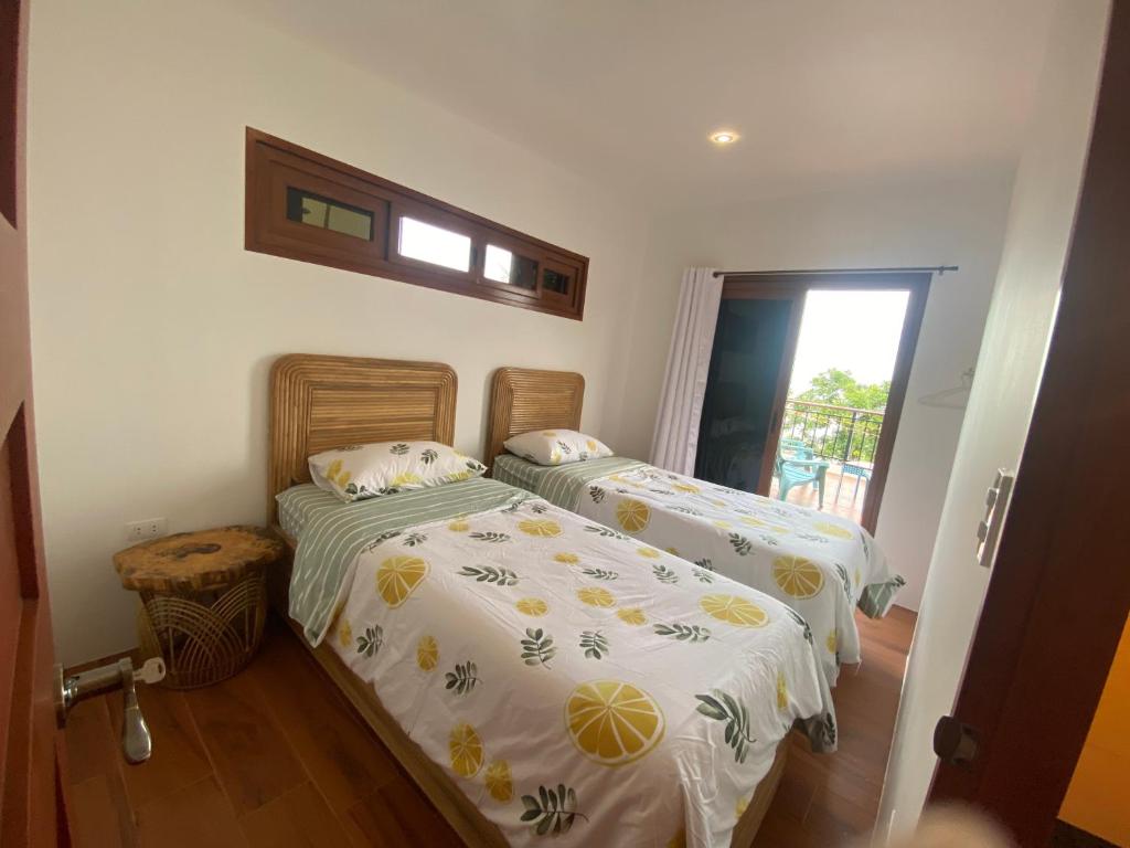 Postel nebo postele na pokoji v ubytování Mard Beach Residence Siquijor