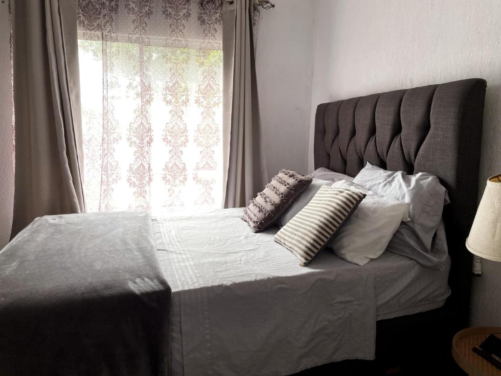 Postel nebo postele na pokoji v ubytování blanc haus