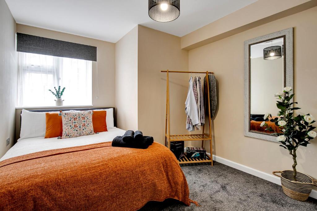 Ένα ή περισσότερα κρεβάτια σε δωμάτιο στο Luxury apartment 8 minutes from Heathrow
