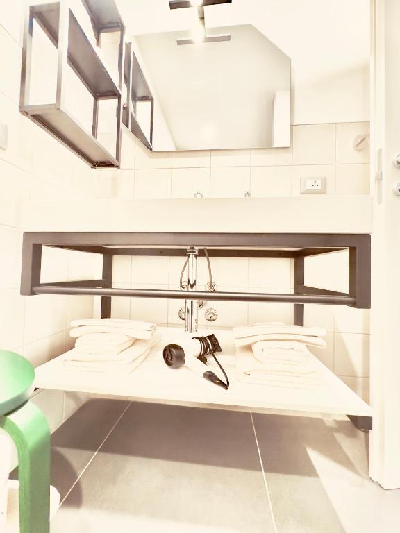 Łóżko lub łóżka w pokoju w obiekcie Smart Silver Apartment Central