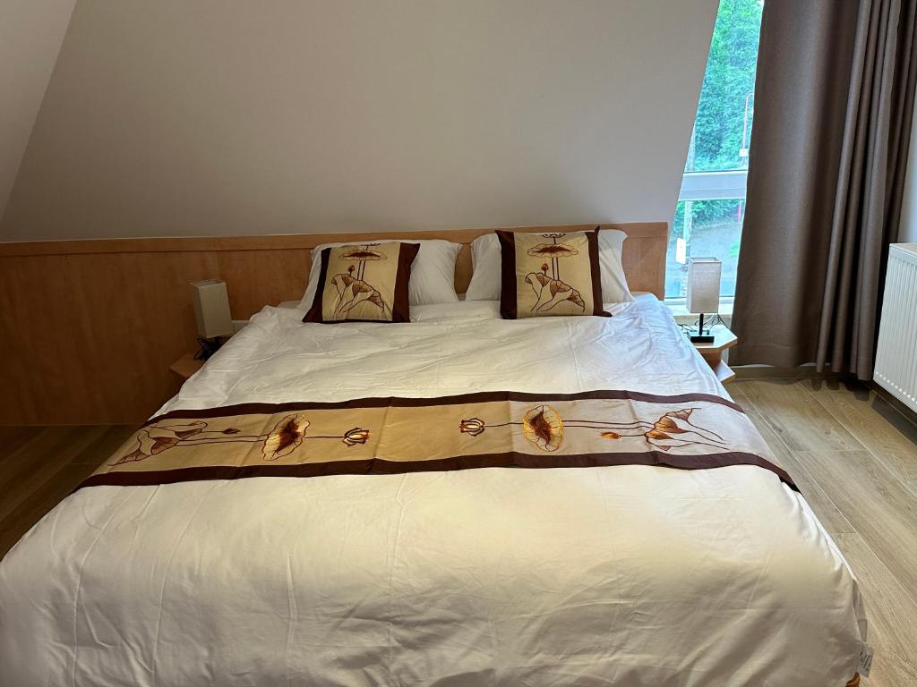 Postel nebo postele na pokoji v ubytování Gästehaus LINH