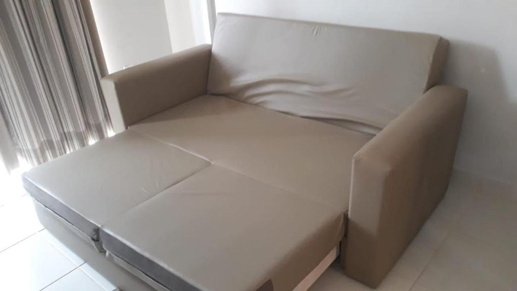 Posezení v ubytování Apartamentos em Rio Quente com maravilhosa área de lazer e excelente localização