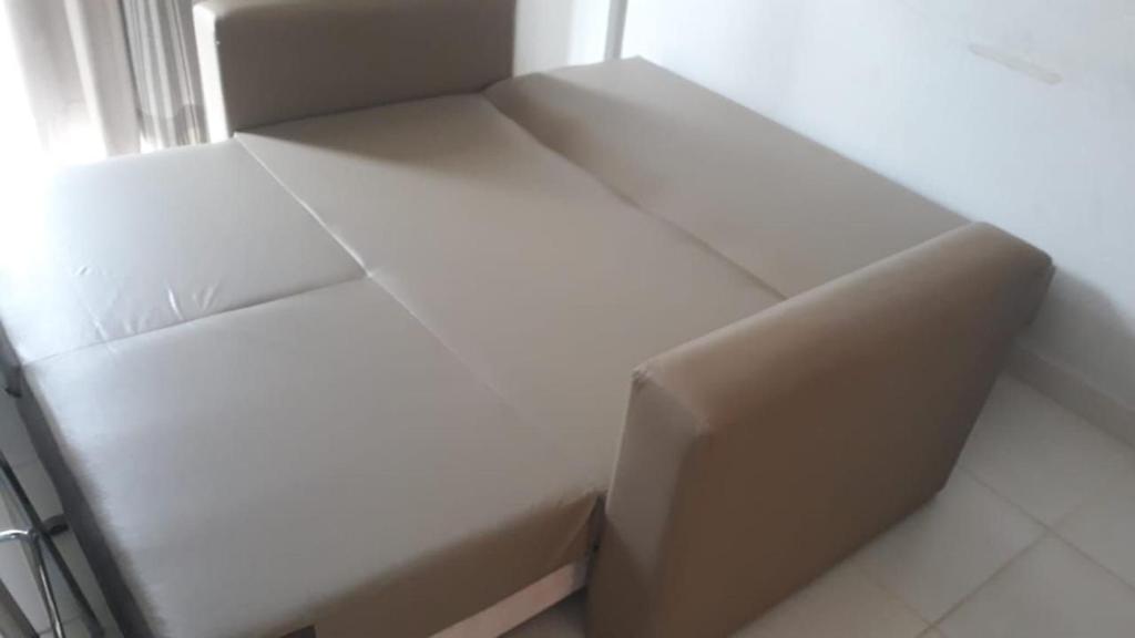 Posezení v ubytování Apartamentos em Rio Quente com maravilhosa área de lazer e excelente localização