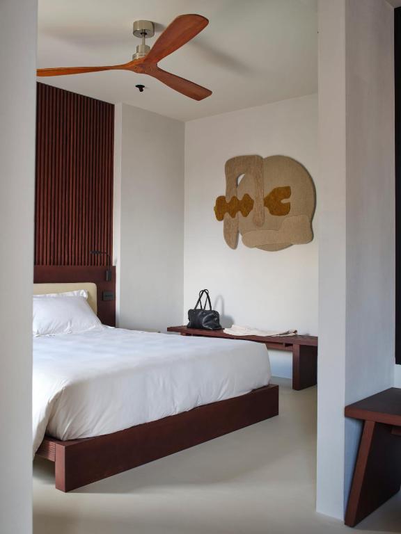 Ein Bett oder Betten in einem Zimmer der Unterkunft Capitolo Riviera