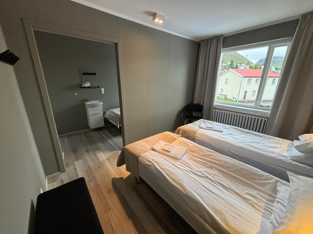 Klara Guesthouse客房内的一张或多张床位