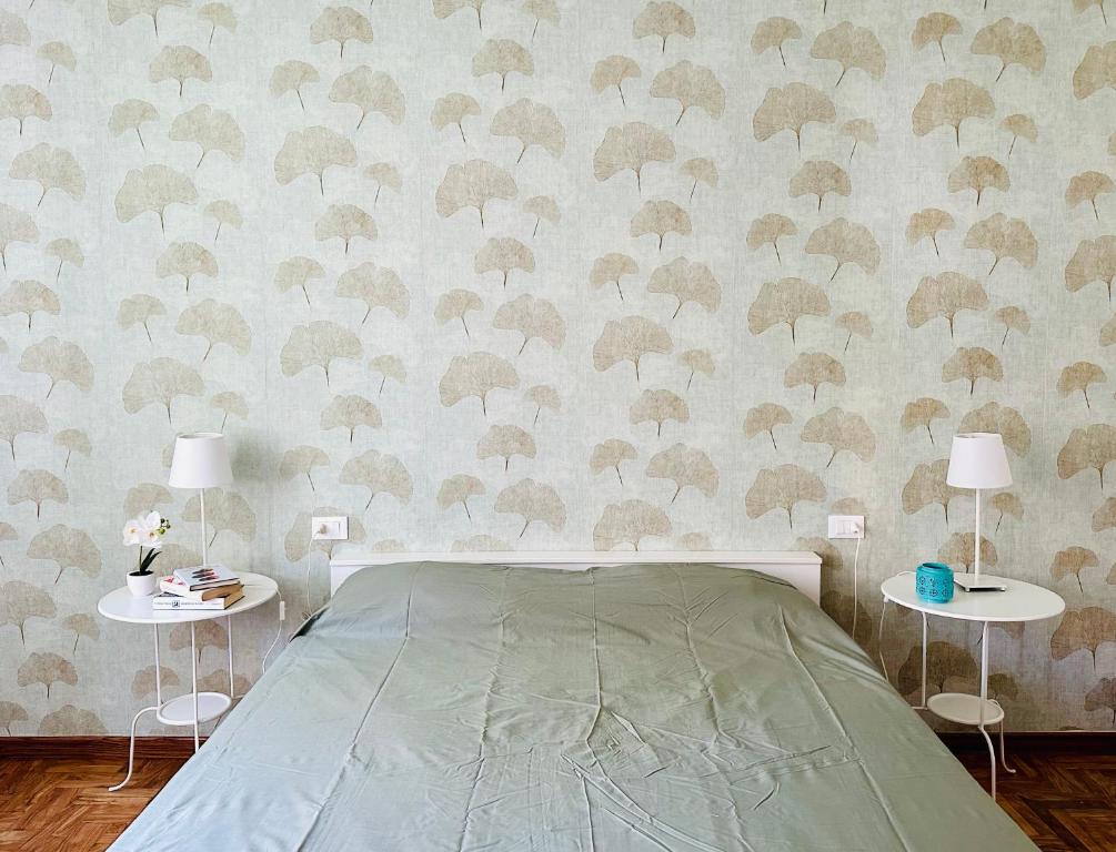 Ένα ή περισσότερα κρεβάτια σε δωμάτιο στο La Casetta-Incantevole casa indipendente