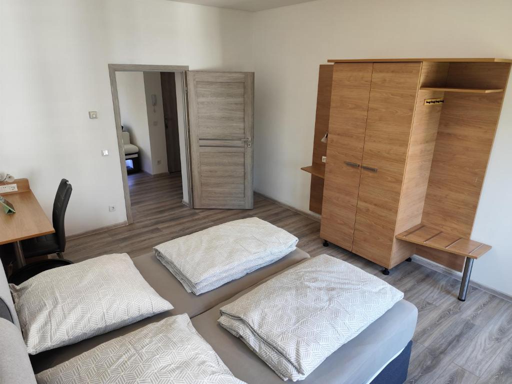 Postel nebo postele na pokoji v ubytování Cocon Zeitz