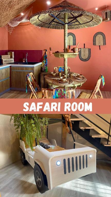 - une salle de safari avec une petite table et un parasol dans l'établissement Serengeti Safari Room, à Sigean