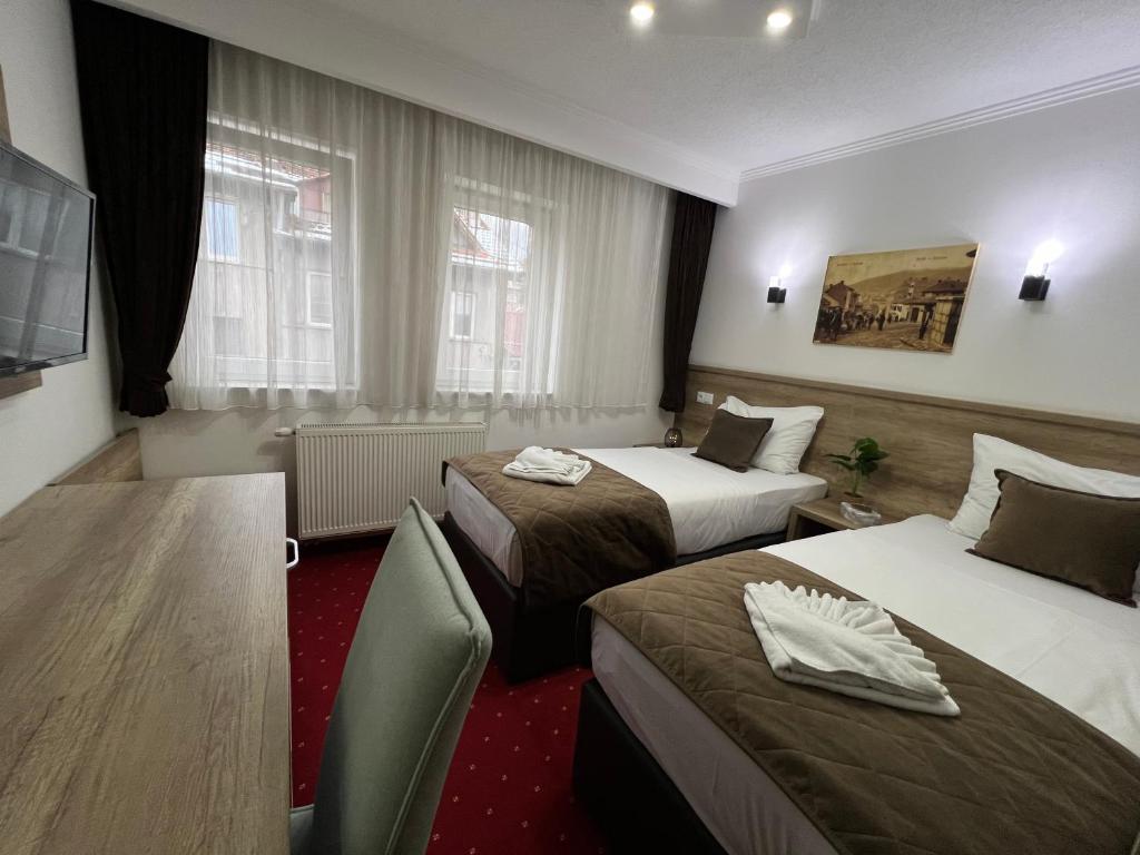 Postel nebo postele na pokoji v ubytování Hotel Nacional Free Parking