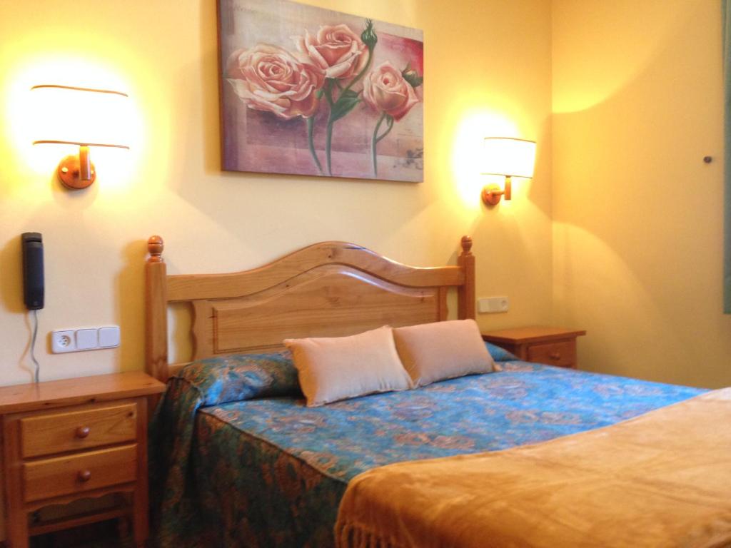 Postel nebo postele na pokoji v ubytování Hotel La Bonaigua