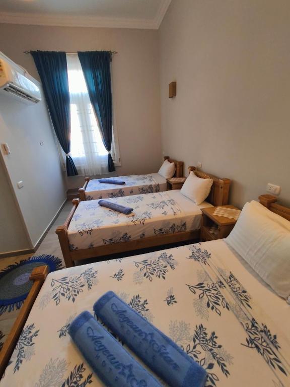 Postel nebo postele na pokoji v ubytování Champollion Palace