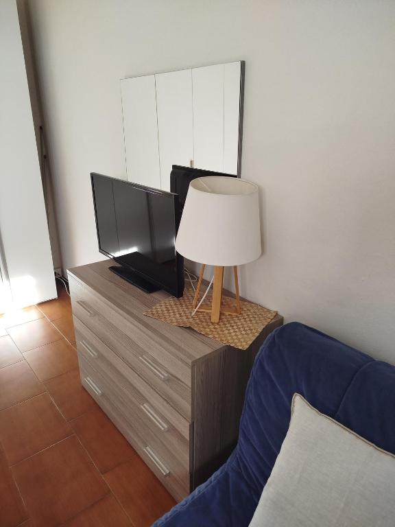 TV a/nebo společenská místnost v ubytování Casa Lilly