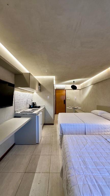 Postel nebo postele na pokoji v ubytování Loft 1 Edf celita Franca Business hotel