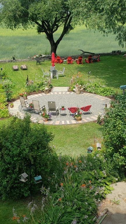 Zahrada ubytování Maison de L'Anse aux oies / Gîte