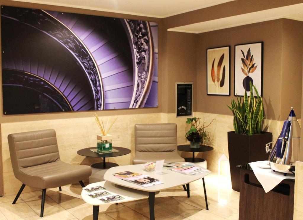 Posezení v ubytování Hotel Indigo Rome - St. George by IHG