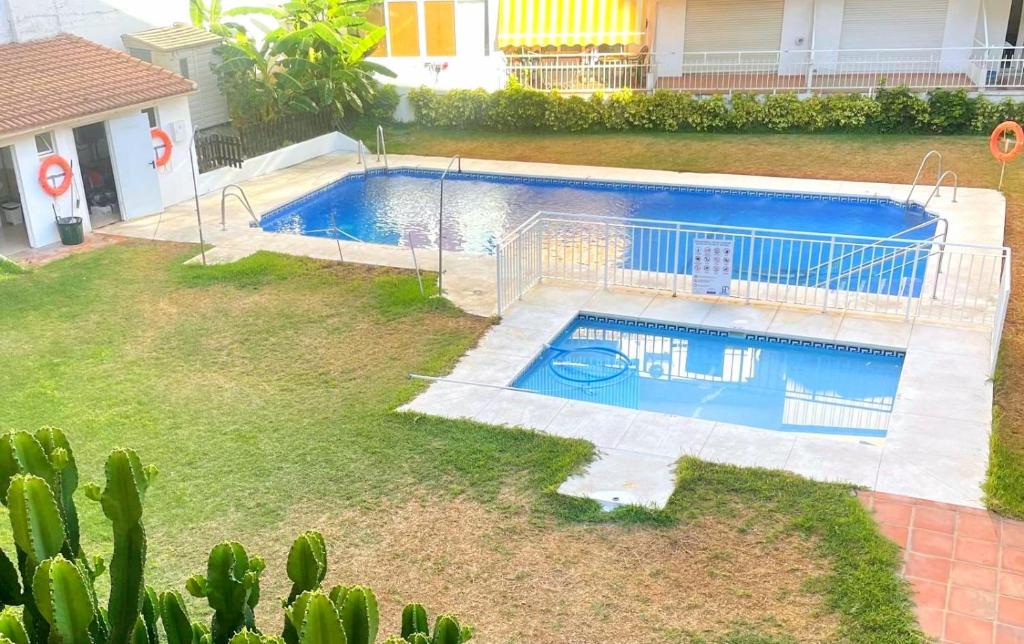 an overhead view of a swimming pool in a yard at Vera Holydays in Torremolinos