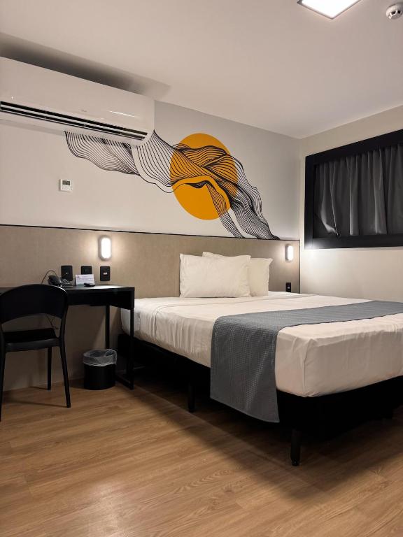 Postel nebo postele na pokoji v ubytování WA HOTEL FORTALEZA