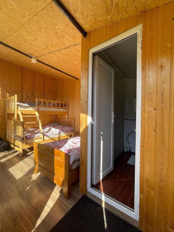 Postel nebo postele na pokoji v ubytování Mountain House in Juta