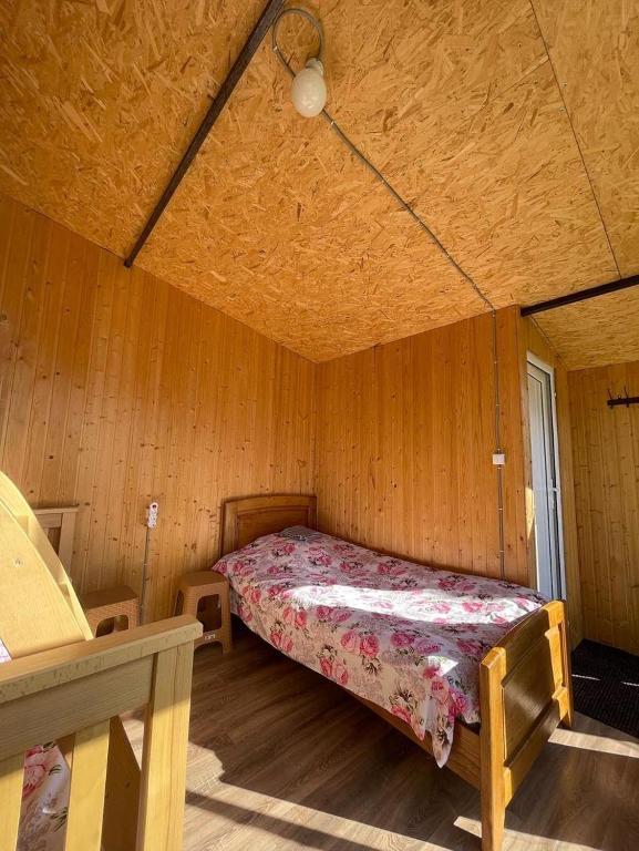 Postel nebo postele na pokoji v ubytování Mountain House in Juta