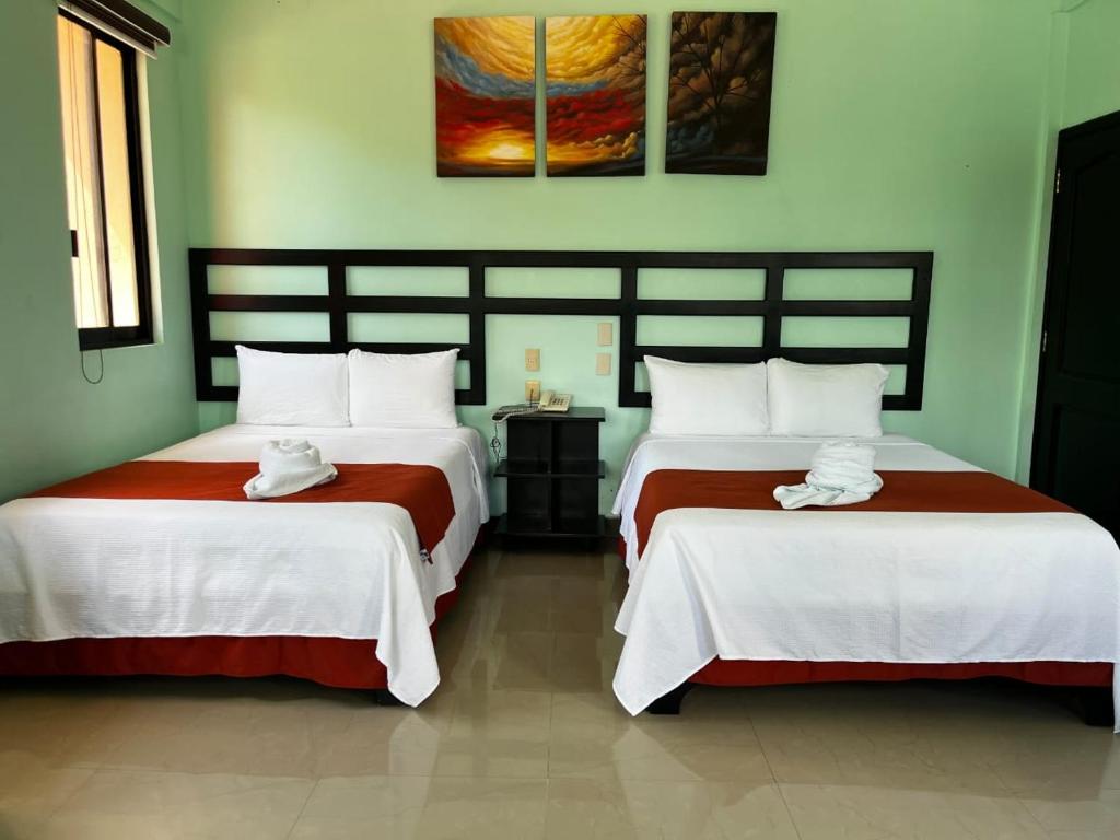 Postel nebo postele na pokoji v ubytování Hotel Castillo Del Rey
