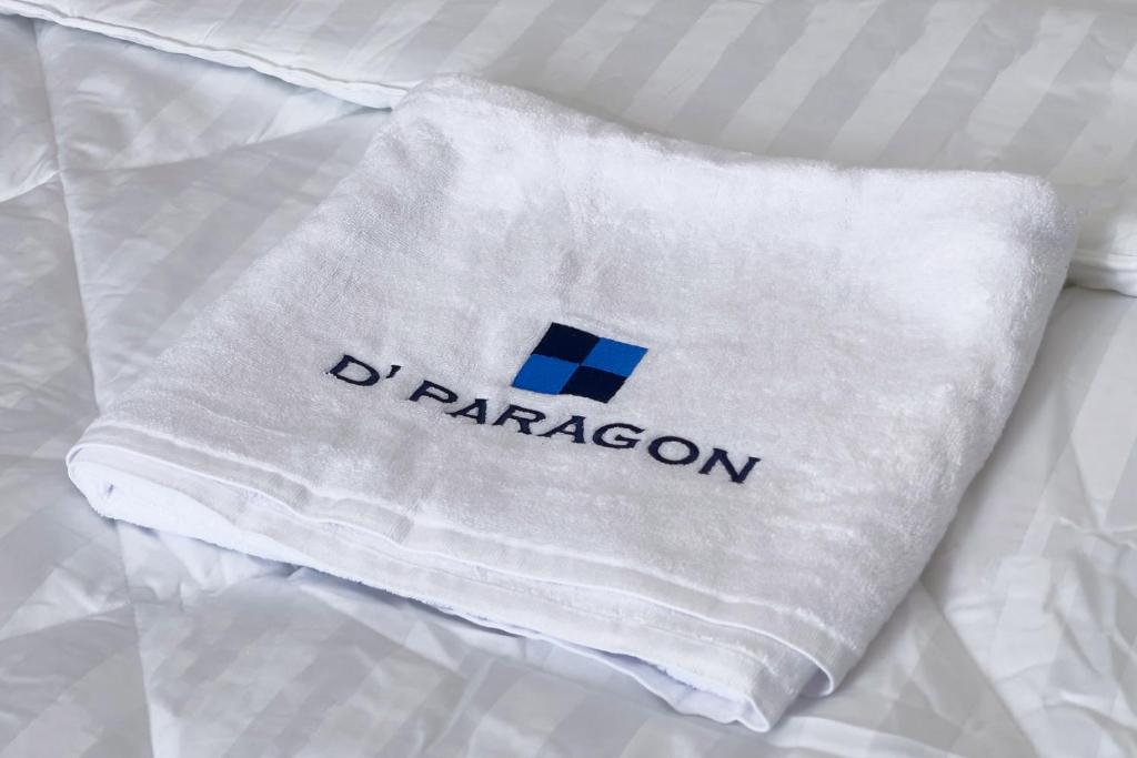 Ένα ή περισσότερα κρεβάτια σε δωμάτιο στο Dparagon Senopati