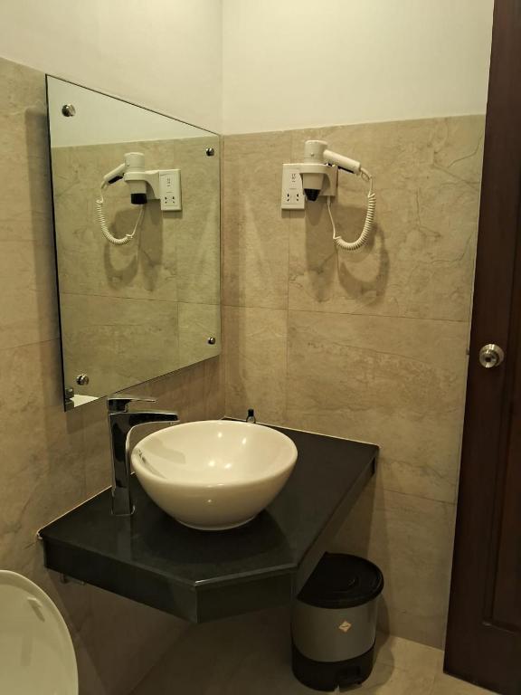 Koupelna v ubytování Rajarata Hotel Anuradhapura