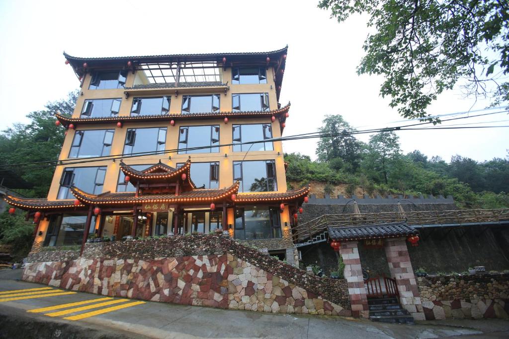a large building with ainese writing on it at Mountain-scenery inn in Zhangjiajie