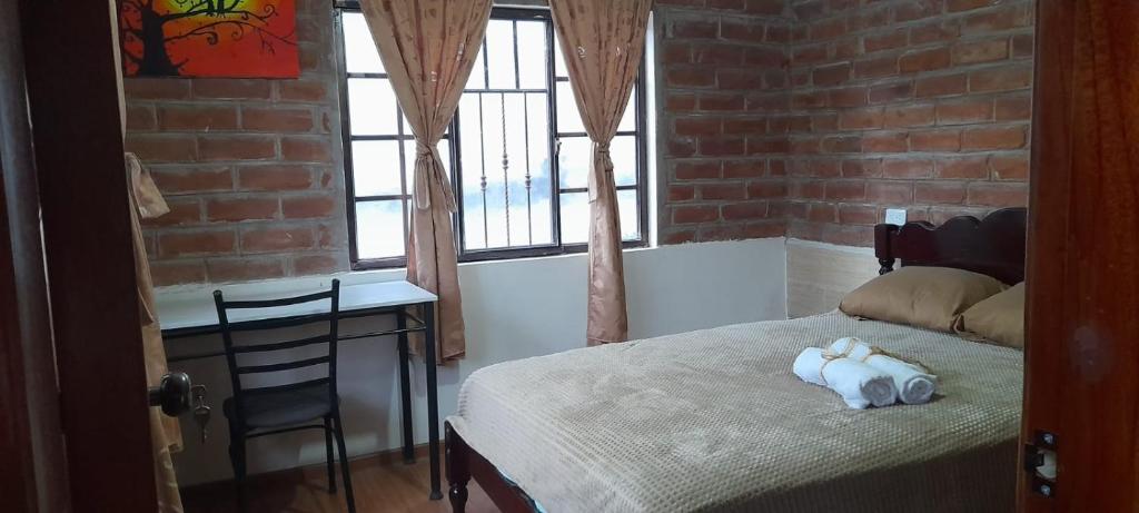 Postel nebo postele na pokoji v ubytování Tranquilidad en el campo