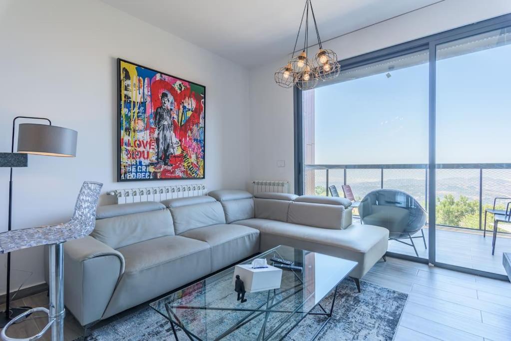 Posezení v ubytování Faqra -2BR Hideaway