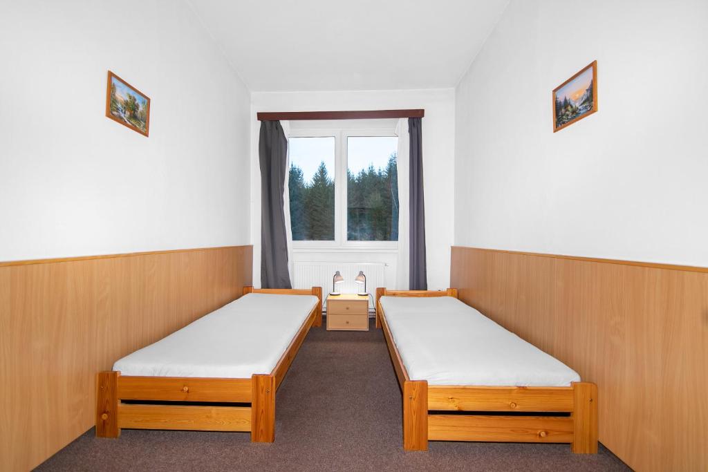 Postel nebo postele na pokoji v ubytování Apartmán Tereza