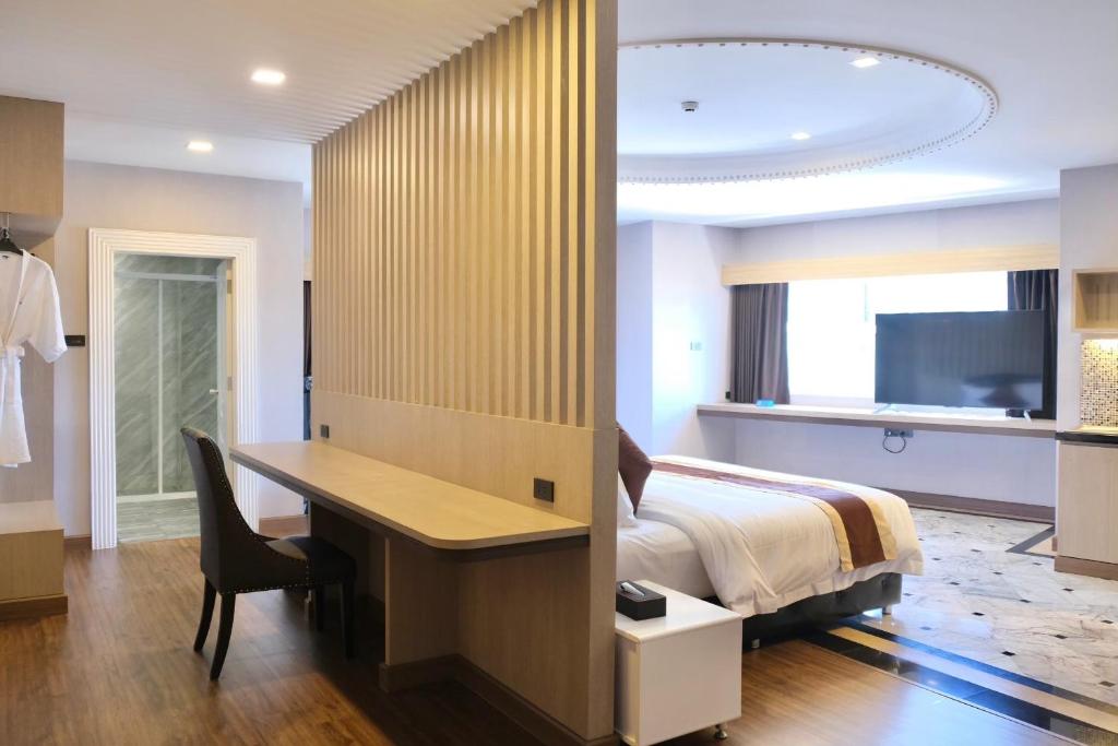 TV a/nebo společenská místnost v ubytování KTK Pattaya Hotel & Residence