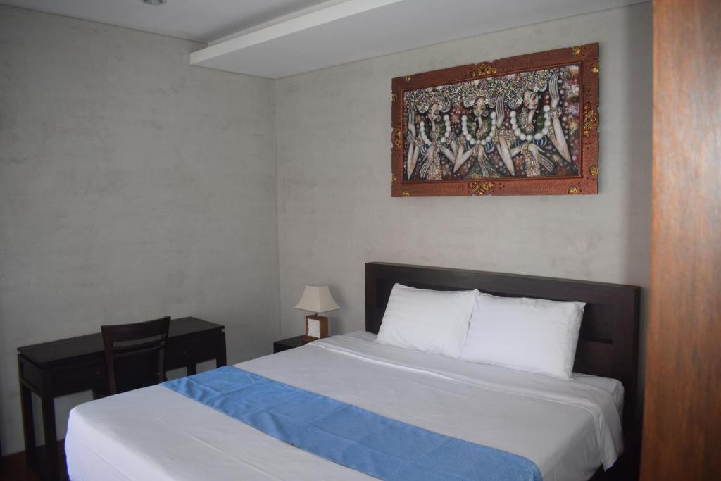 Postel nebo postele na pokoji v ubytování Werkudara Guest House