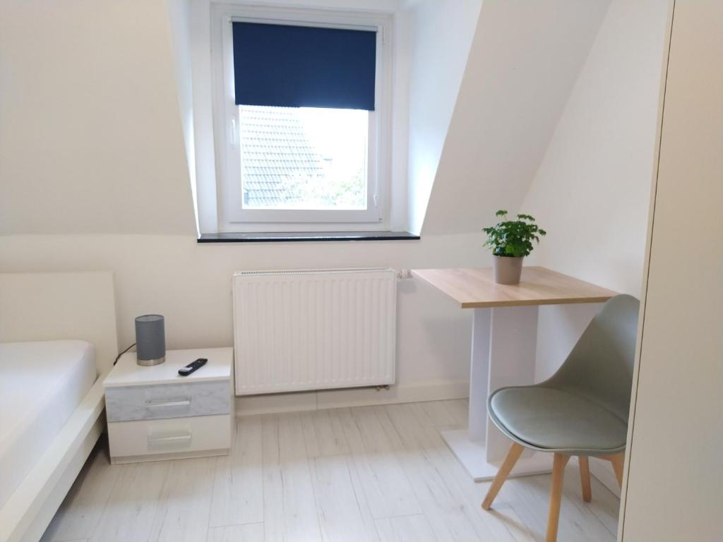 Postel nebo postele na pokoji v ubytování Ruhe am Walde
