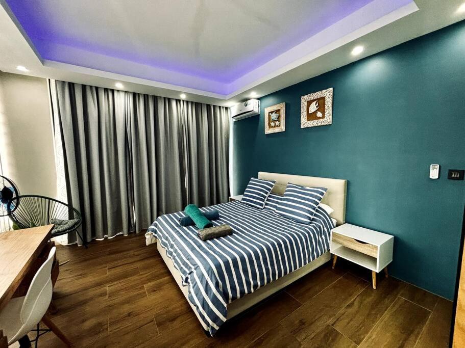 Postel nebo postele na pokoji v ubytování Sublima Villa, Luxe et élégance