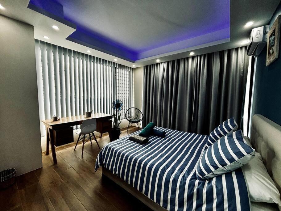 Postel nebo postele na pokoji v ubytování Sublima Villa, Luxe et élégance