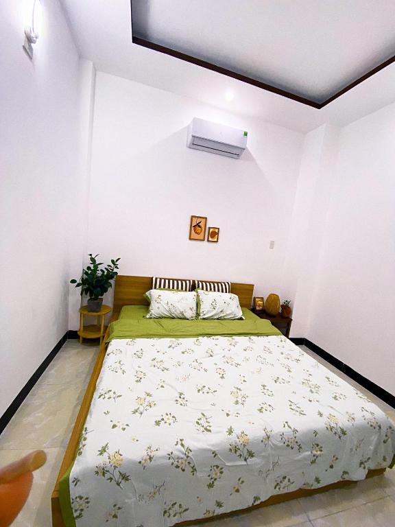 Postel nebo postele na pokoji v ubytování Homestay Green Quy Nhơn