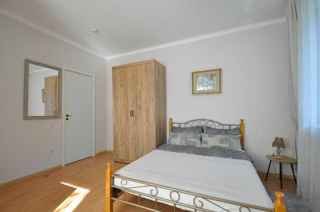 Postel nebo postele na pokoji v ubytování Prestige Apartment