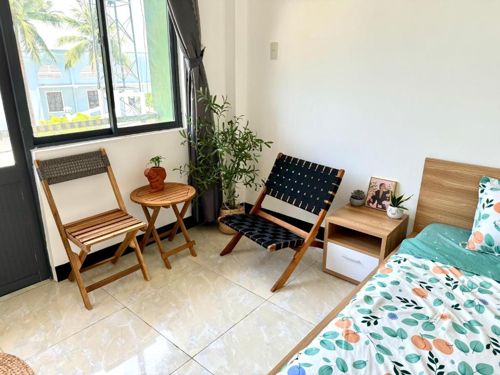Postel nebo postele na pokoji v ubytování Homestay Green Quy Nhơn