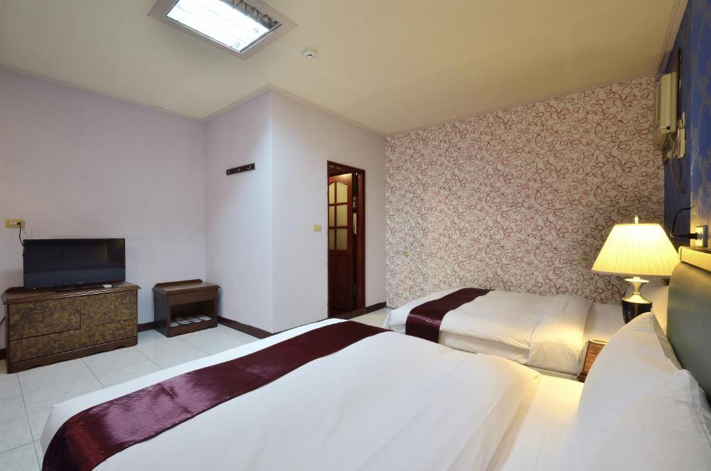 Jiuning Business Hotel - Standaard Viervoudige Kamer